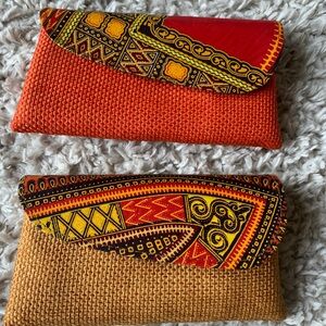 (2) Kenyan/ African fabric clutch handbags. Durable material in great colors.